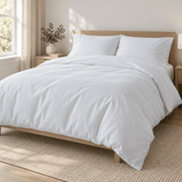 White AllergyCare cotton duvet cover on a bed in a bright bedroom