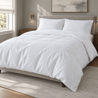 White AllergyCare stretch knit duvet cover on a bed in a neutral bedroom