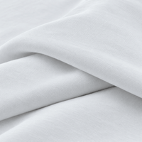 Close-up of the smooth white stretch knit fabric