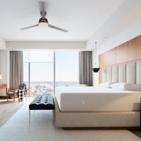 Elite encasement on a made hotel bed, illustrating hospitality-grade mattress protection