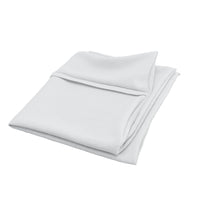 Folded white AllergyCare Pillow Protector on a white background