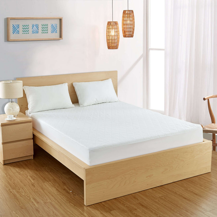 Bargoose Quilted Waterproof Sofa Sleeper Mattress Pads - Anchor Band on a bed in a modern bedroom setting.